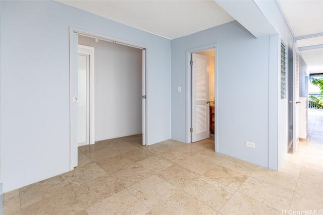 unfurnished bedroom featuring a closet