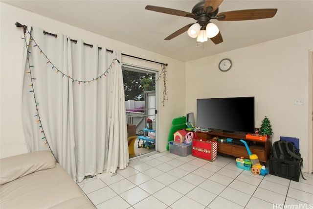 tiled living room with ceiling fan