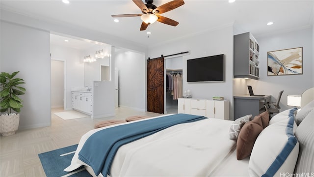 bedroom with a barn door, baseboards, a walk in closet, crown molding, and recessed lighting