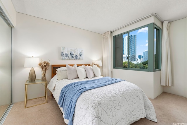 1314 Kalakaua Ave Unit 406, Honolulu, HI 96826 - bedroom featuring carpet flooring and a city view