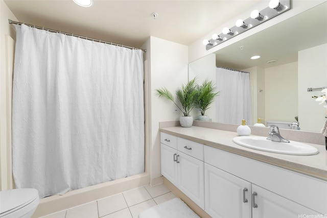 1314 Kalakaua Ave Unit 406, Honolulu, HI 96826 - bathroom featuring tile patterned flooring, vanity, toilet, and recessed lighting