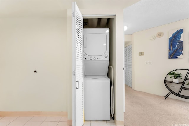 1314 Kalakaua Ave Unit 406, Honolulu, HI 96826 - laundry area featuring stacked washer and clothes dryer and light colored carpet