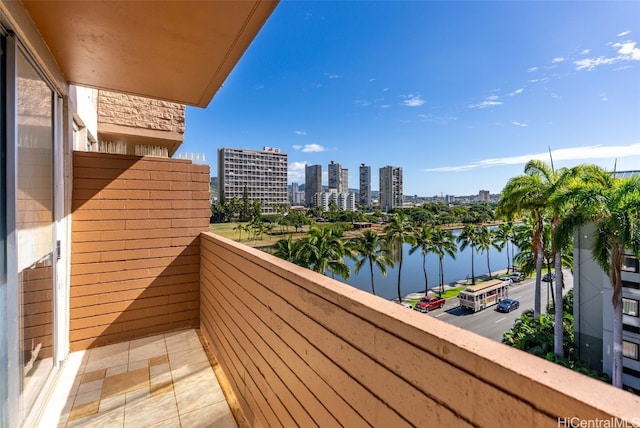 balcony featuring a water view