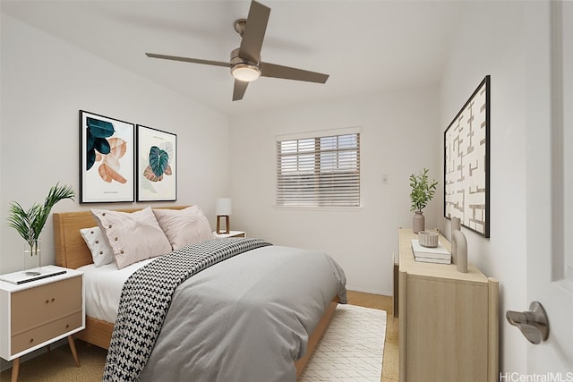 carpeted bedroom featuring ceiling fan