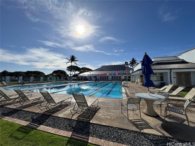 view of swimming pool with a patio