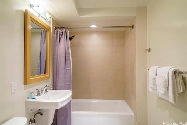 bathroom featuring shower / bath combination with curtain