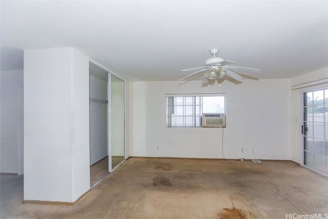 unfurnished bedroom featuring cooling unit, light colored carpet, and ceiling fan