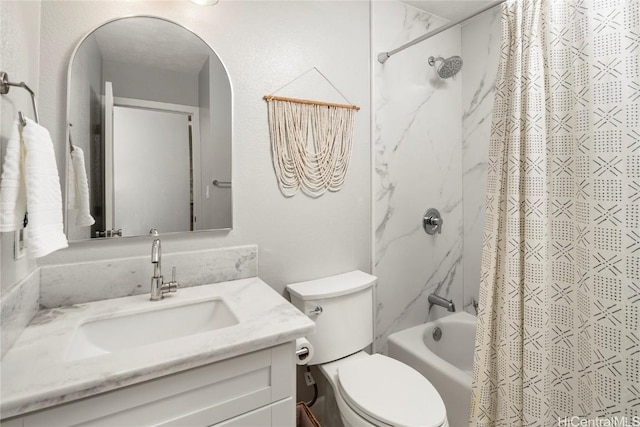 full bathroom featuring vanity, shower / tub combo, and toilet