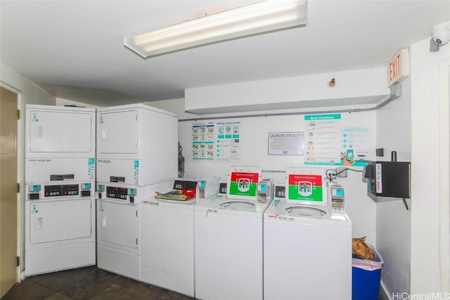 laundry room featuring stacked washer and dryer and washing machine and dryer