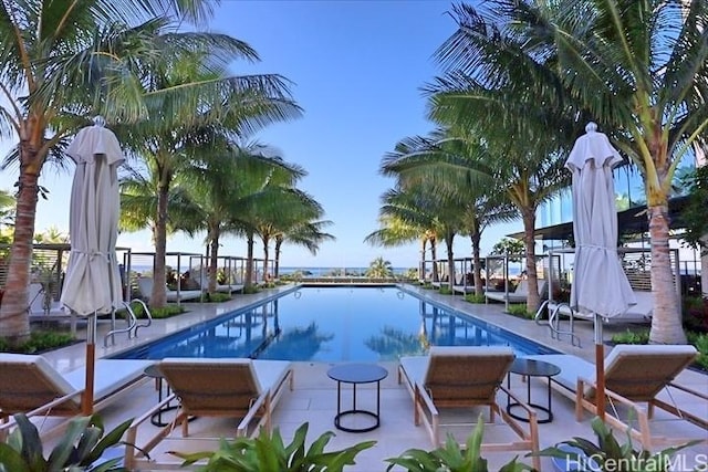 view of swimming pool featuring a patio