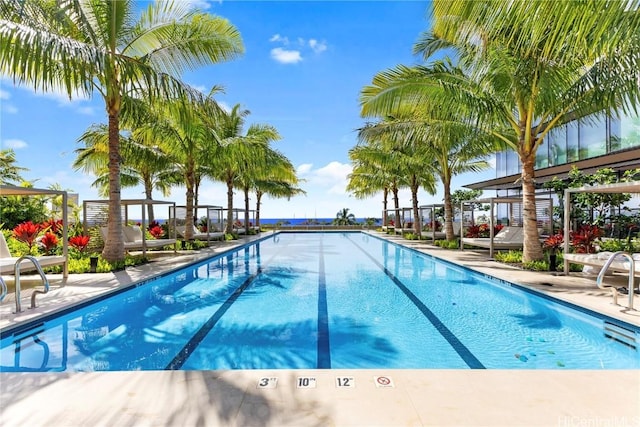 community pool featuring a patio area