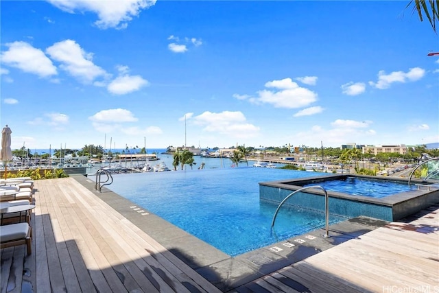 community pool featuring a water view