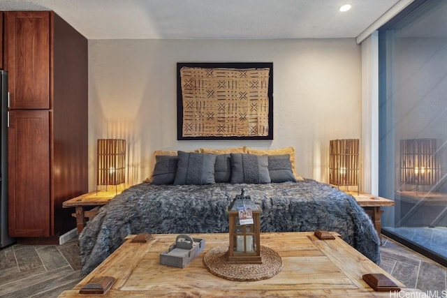 bedroom with dark parquet flooring