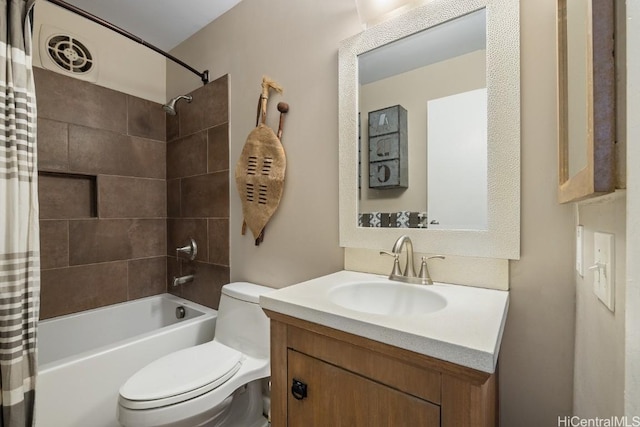 full bathroom featuring vanity, shower / tub combo with curtain, and toilet