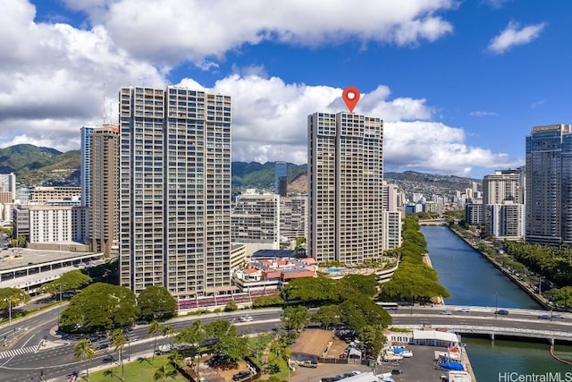 city view featuring a water and mountain view