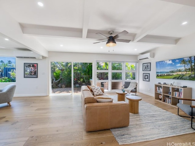 living room with ceiling fan, beam ceiling, a wall unit AC, and light hardwood / wood-style flooring