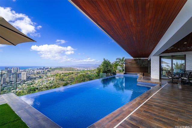 2809 Round Top Dr, Honolulu, HI 96822 - view of swimming pool with an infinity pool and a view of city