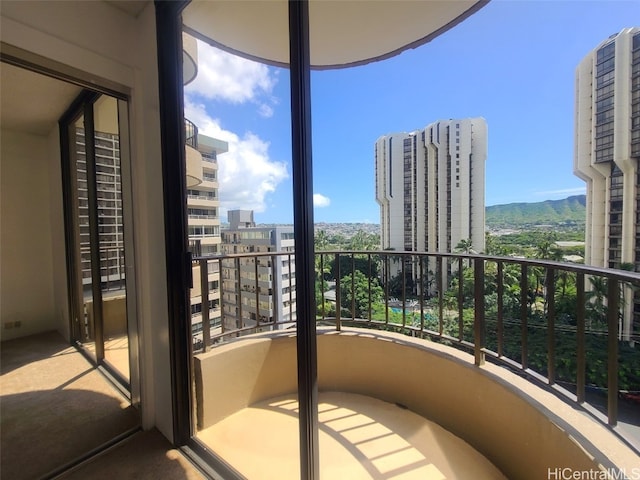 balcony featuring a view of city