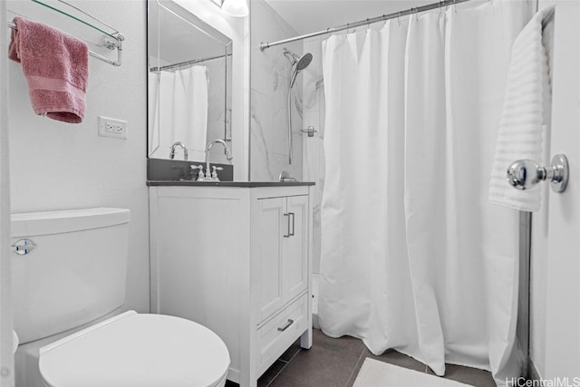 bathroom with vanity, a shower with curtain, and toilet