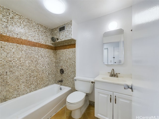 full bathroom with vanity, toilet, tiled shower / bath combo, and tile patterned flooring