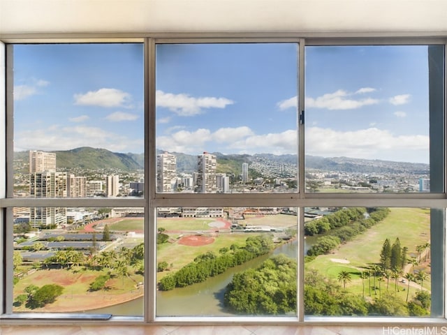 interior space featuring a water and mountain view