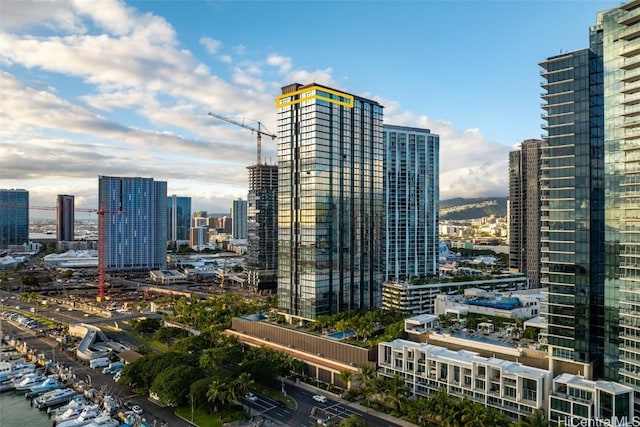 property's view of city featuring a water view