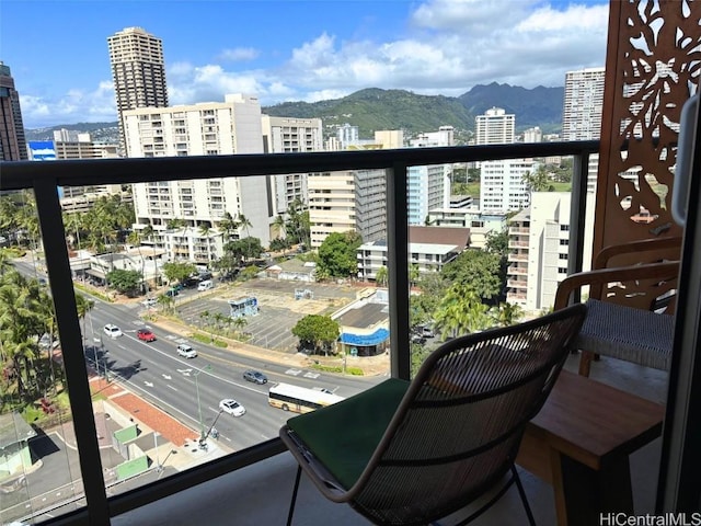 balcony featuring a mountain view