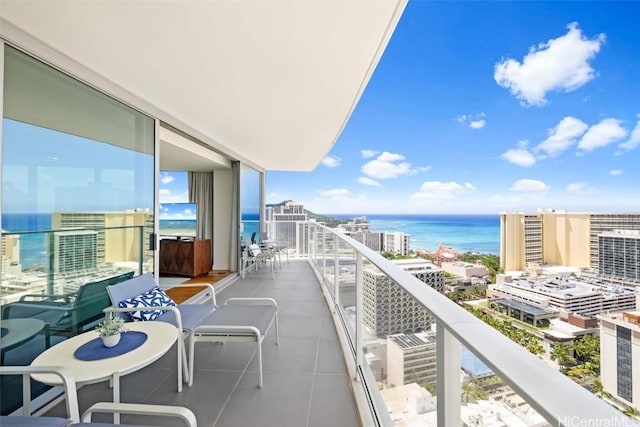 balcony featuring a water view