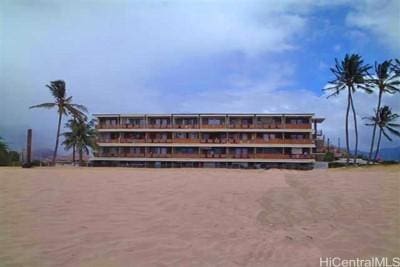 view of building exterior featuring a water view