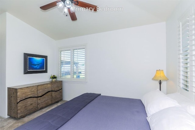 bedroom with lofted ceiling and ceiling fan