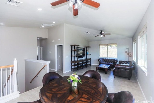 living room with lofted ceiling and light wood-type flooring