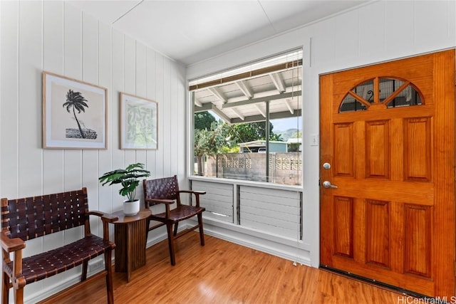 foyer entrance with light wood-style flooring