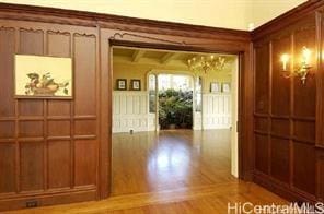 hallway featuring beam ceiling