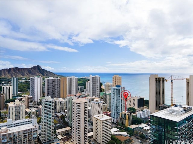 city view with a water and mountain view