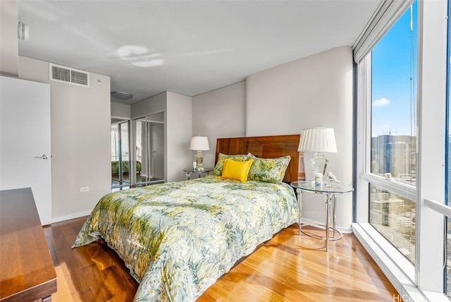 bedroom featuring hardwood / wood-style floors