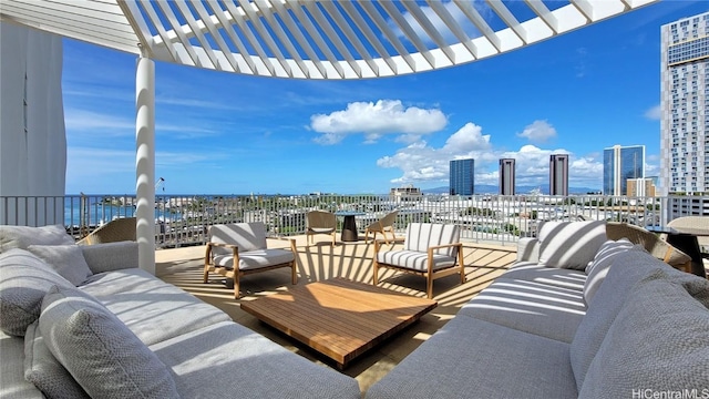 view of patio with outdoor lounge area and a pergola