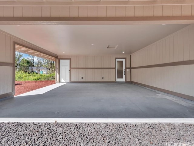 garage with wooden walls