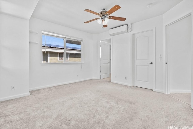 unfurnished bedroom with ceiling fan, light carpet, and an AC wall unit