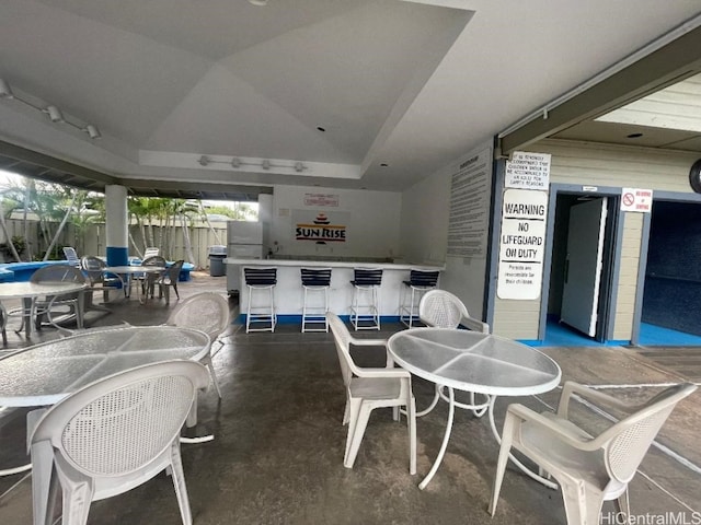 view of patio featuring a bar