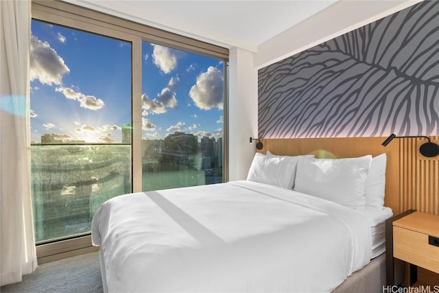 bedroom featuring expansive windows