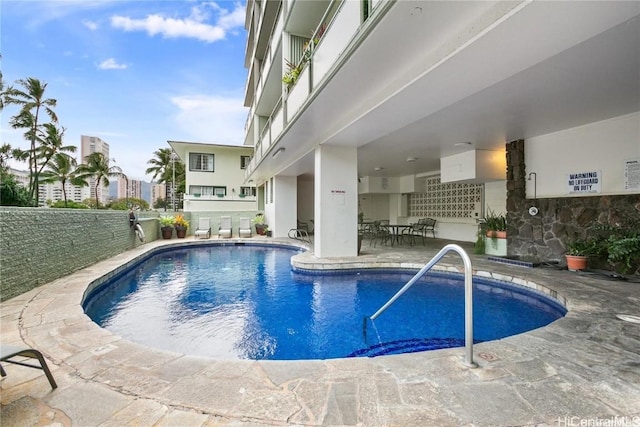 view of pool with a patio area