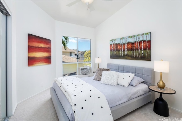 carpeted bedroom featuring cooling unit, ceiling fan, and baseboards