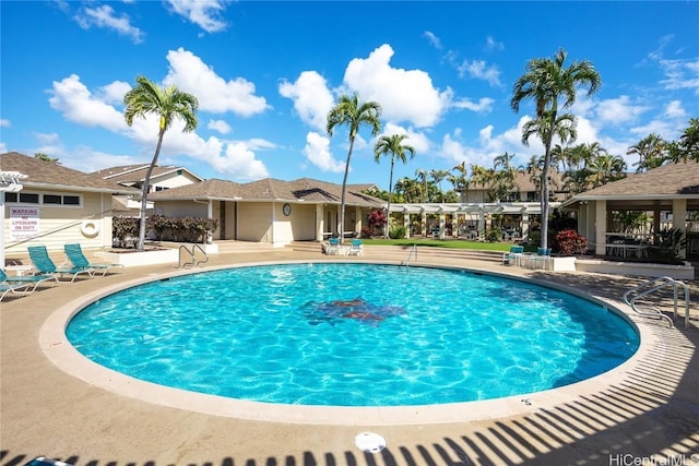 pool featuring a patio area