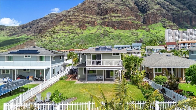 exterior space with a residential view and a mountain view