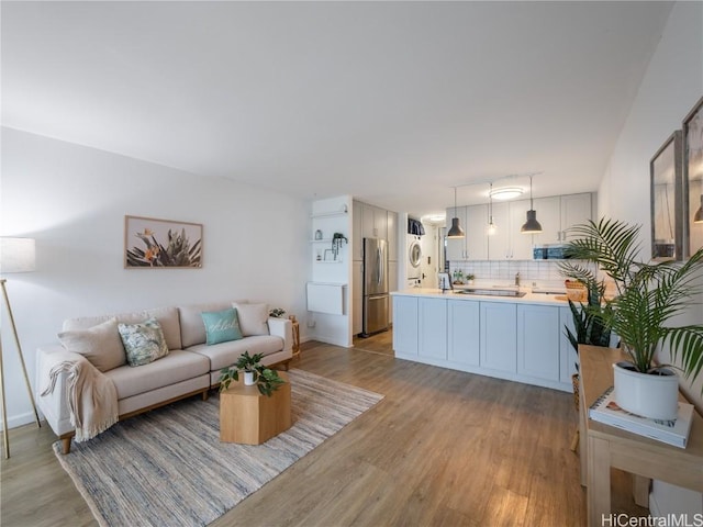 living room with light hardwood / wood-style flooring