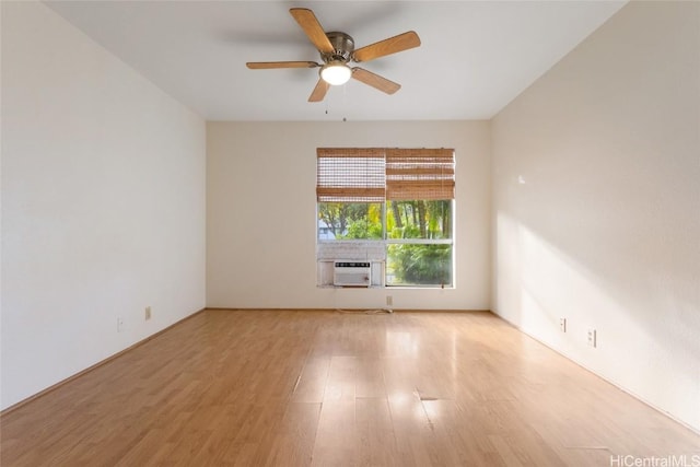 unfurnished room with ceiling fan and light hardwood / wood-style flooring