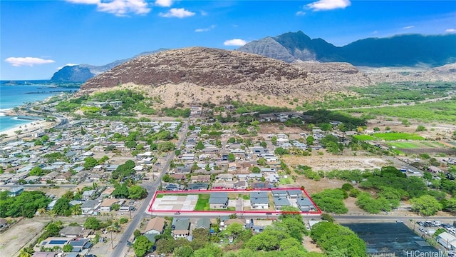 bird's eye view featuring a water and mountain view