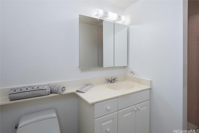 full bath with vanity and toilet