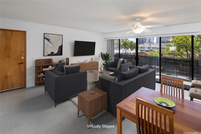 907 Birch St Unit 201, Honolulu, HI 96814 - living area featuring ceiling fan, a textured ceiling, and light floors