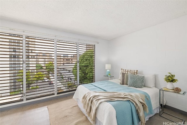 bedroom featuring a textured ceiling